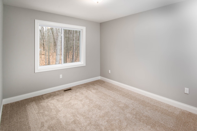 view of carpeted spare room