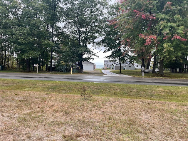 view of yard featuring a garage