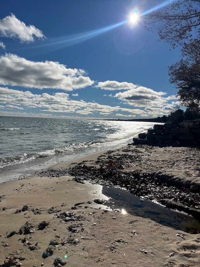 property view of water featuring a view of the beach