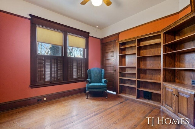 unfurnished room featuring hardwood / wood-style flooring and ceiling fan