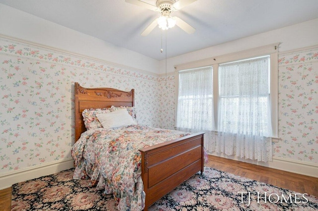 bedroom featuring light hardwood / wood-style flooring and ceiling fan