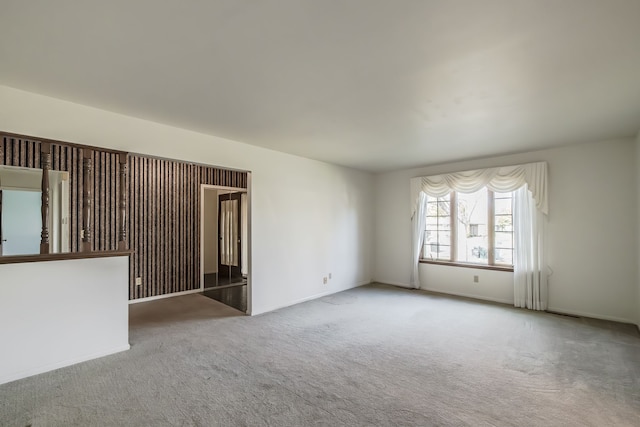 empty room featuring carpet floors