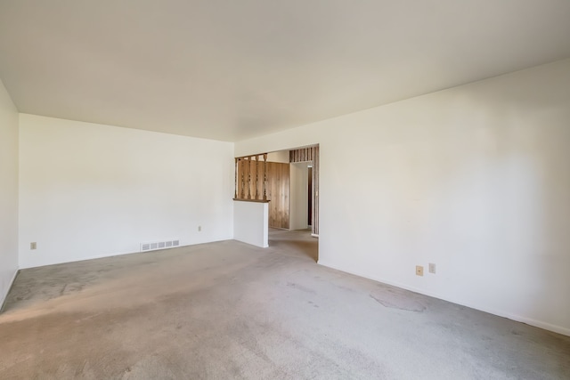 spare room with light colored carpet