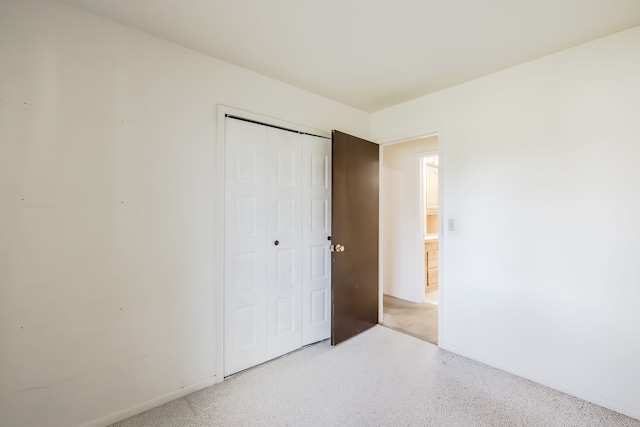 unfurnished bedroom featuring a closet