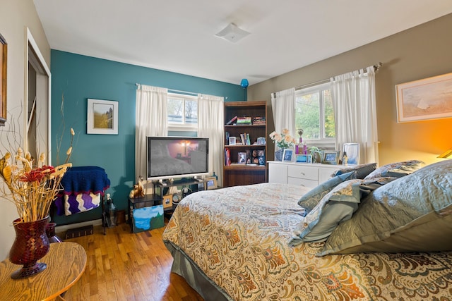 bedroom featuring hardwood / wood-style floors