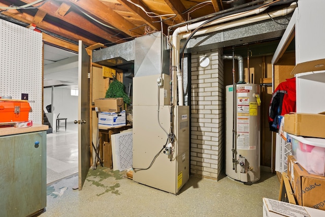 utility room featuring heating unit and gas water heater