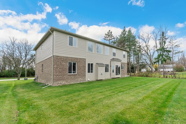 1685 E Wattles Rd, Troy, MI 48085 - rear view of house featuring brick siding