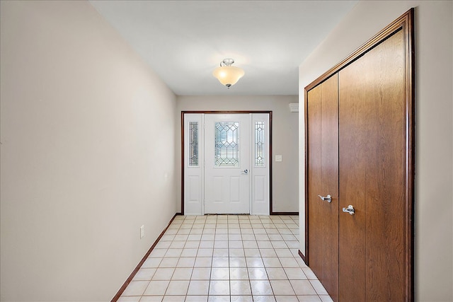 entryway featuring light tile patterned floors