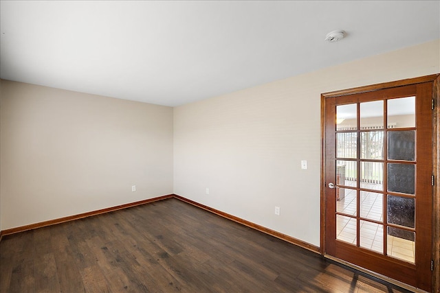 unfurnished room with hardwood / wood-style floors