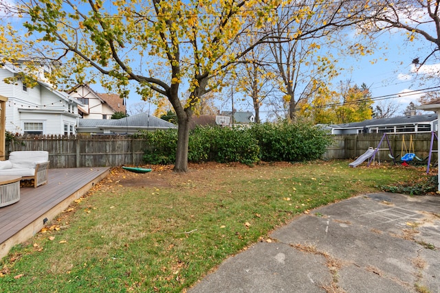 view of yard with a wooden deck