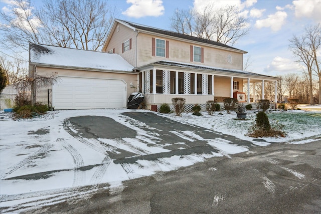 view of front facade featuring a porch and a garage