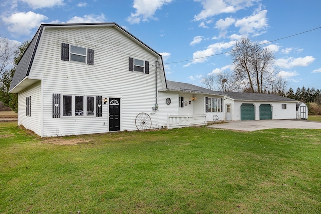 back of house with a yard