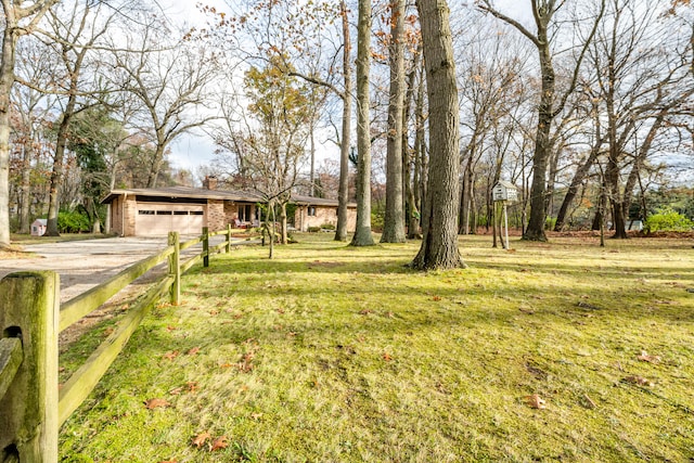 view of yard with a garage