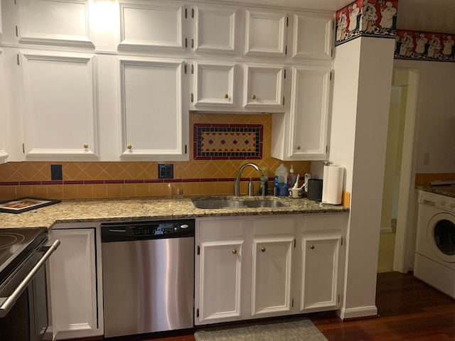 kitchen featuring stainless steel appliances, white cabinetry, washer / clothes dryer, and sink