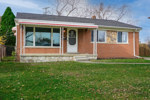 view of front of house with a front lawn