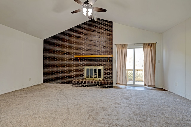 unfurnished living room featuring ceiling fan, carpet floors, lofted ceiling, and a brick fireplace