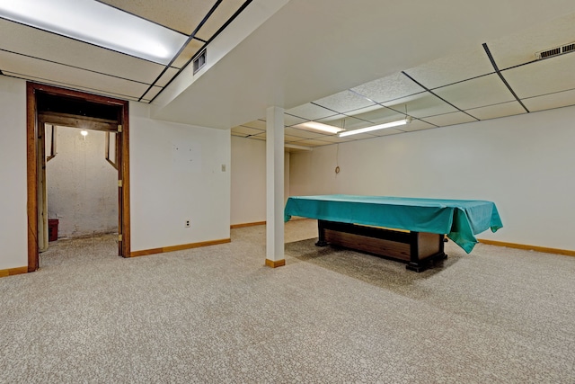 game room featuring carpet and a drop ceiling