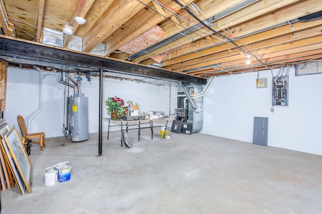 basement with heating unit, electric panel, and water heater