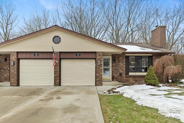 single story home with a garage