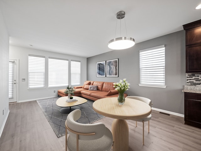 living room featuring light wood-type flooring