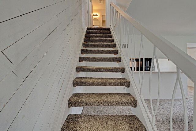 2765 Fox Hollow Ct, Lake Orion, MI 48360 - staircase featuring carpet flooring