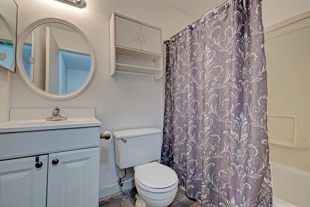 2765 Fox Hollow Ct, Lake Orion, MI 48360 - full bathroom with vanity, toilet, shower / bath combo with shower curtain, and baseboards