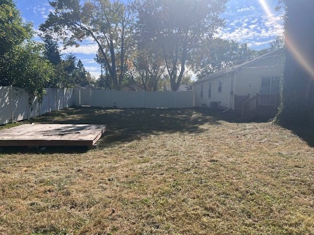 view of yard featuring a wooden deck