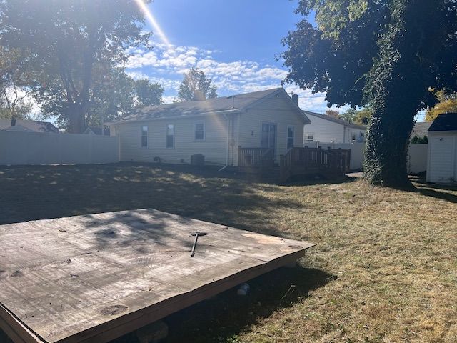 view of yard featuring a wooden deck