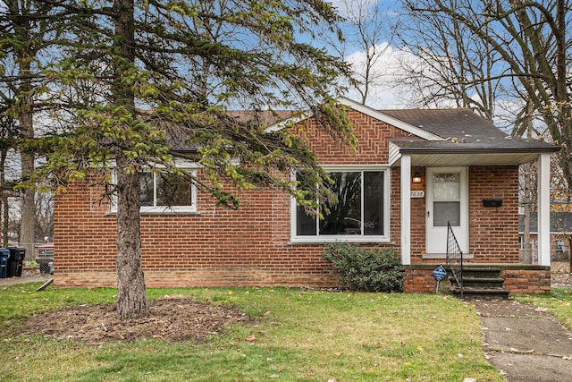 bungalow with a front yard