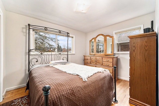 bedroom with wood-type flooring