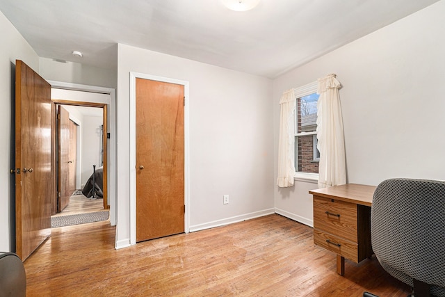 office space featuring light hardwood / wood-style floors