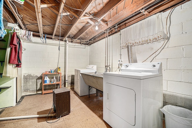 laundry room featuring washing machine and dryer