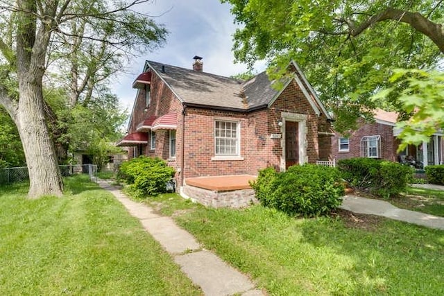 view of front of home with a front yard