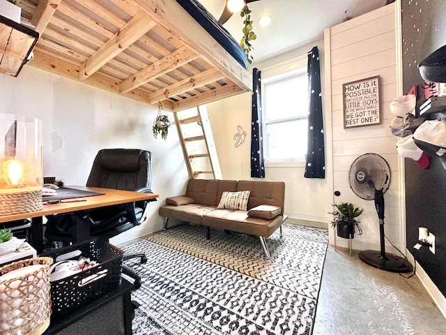 home office with concrete flooring and wood ceiling