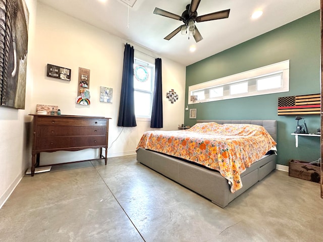 bedroom with ceiling fan and concrete floors