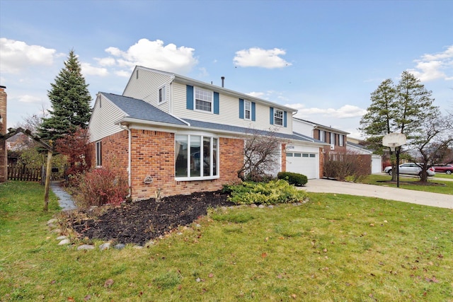 view of property with a garage and a front lawn