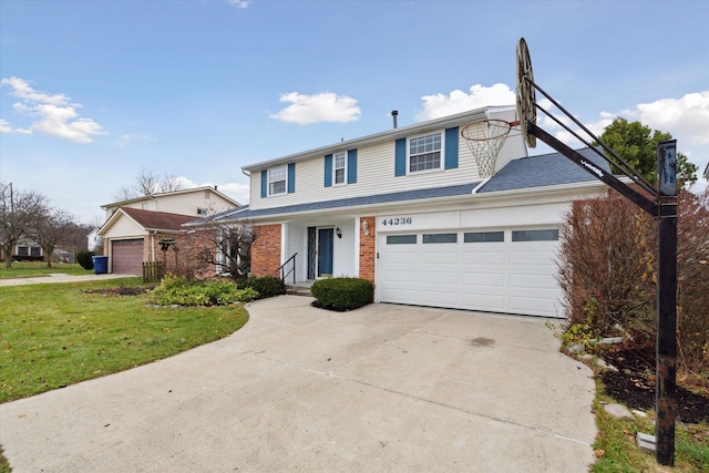 front of property featuring a front lawn and a garage