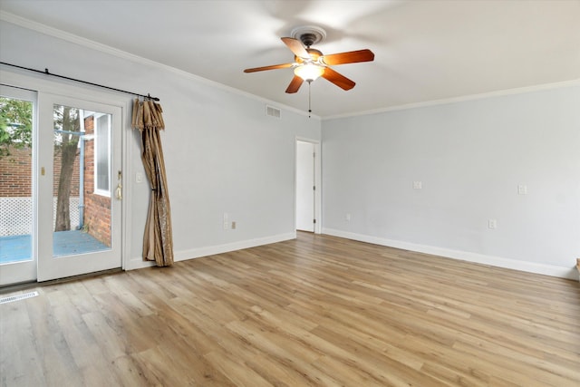 empty room featuring crown molding, ceiling fan, and light wood-type flooring