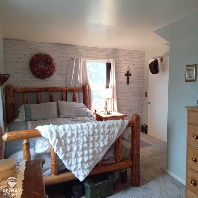 bedroom featuring light carpet