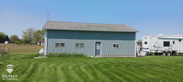 view of outdoor structure with a yard