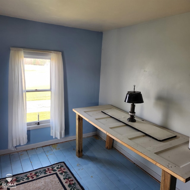 unfurnished office featuring light wood-type flooring