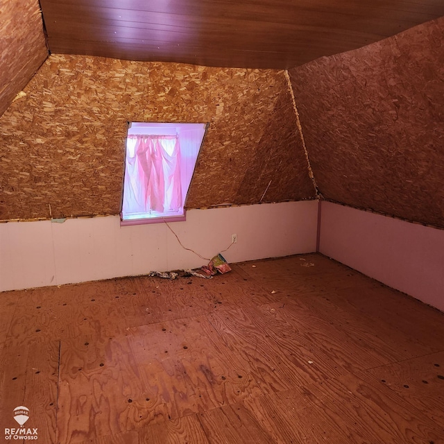 bonus room featuring vaulted ceiling and wooden ceiling