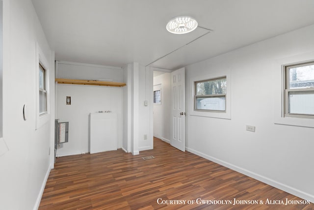 interior space featuring dark wood-type flooring