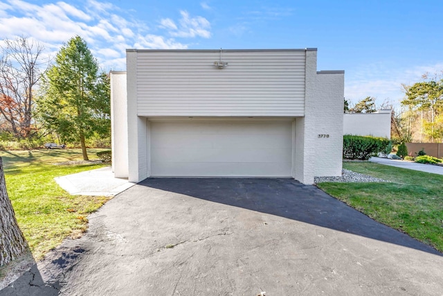 garage with a yard