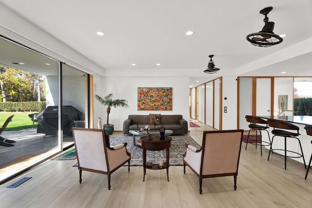 living room featuring light wood-type flooring