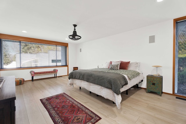 bedroom featuring light hardwood / wood-style floors