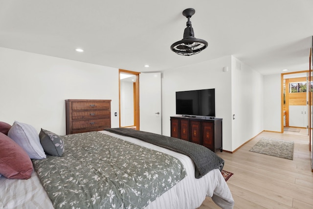 bedroom with light hardwood / wood-style flooring