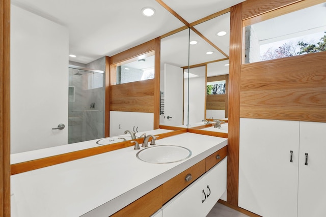 bathroom featuring vanity and walk in shower