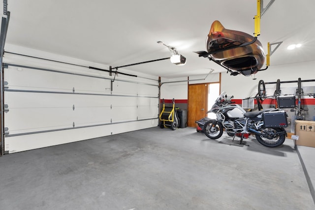 garage featuring a garage door opener