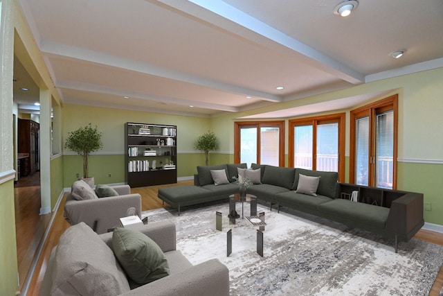 living area with baseboards, recessed lighting, wood finished floors, and beam ceiling